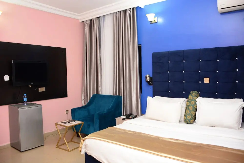 Jasmines Place and Suites - Chambres