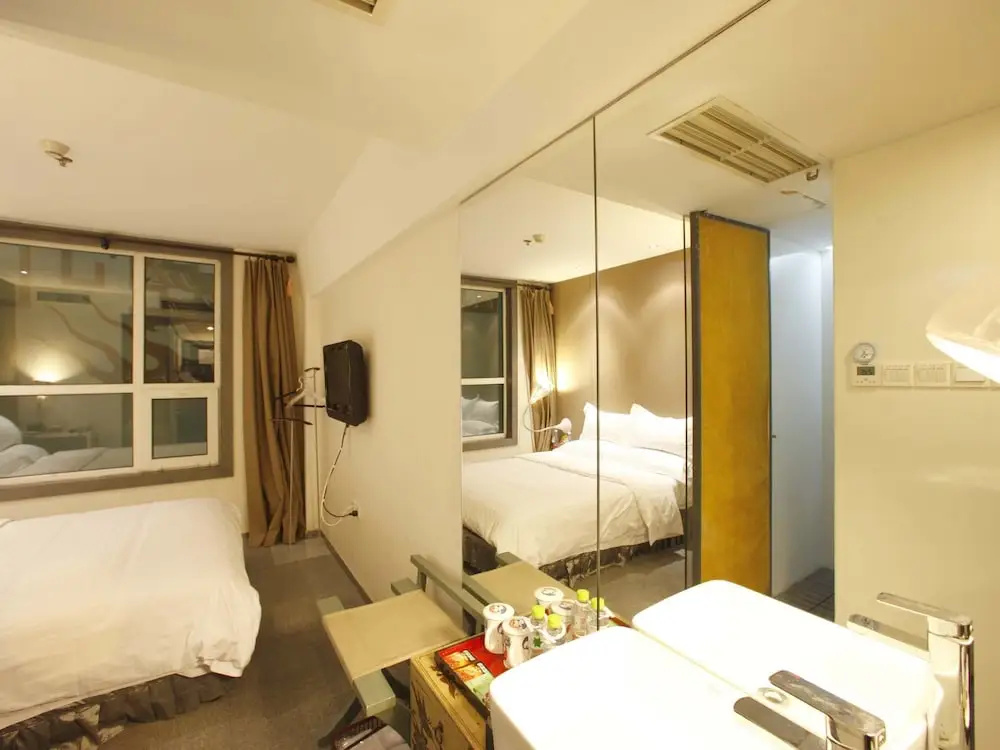 China Community Art Habitat Hotel - Chambres