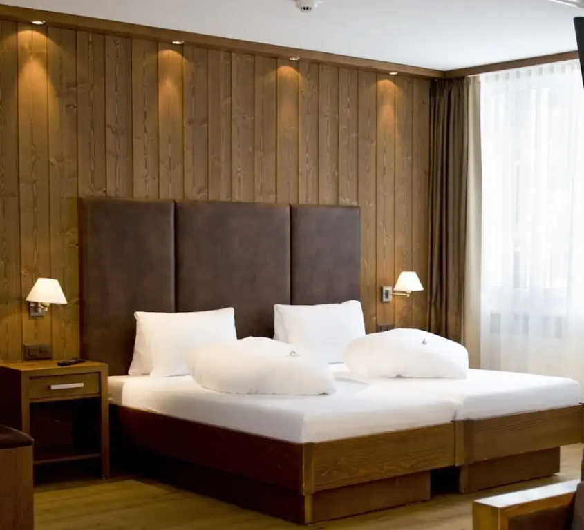 Hotel Quellenhof Leukerbad - Chambres