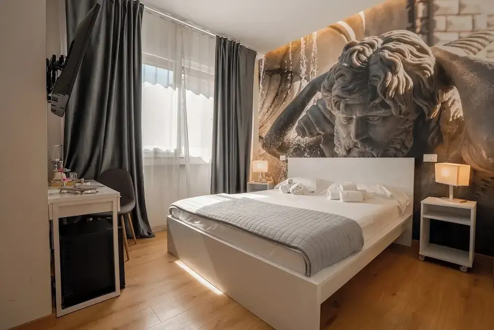 Deluxe Quadruple room with city view