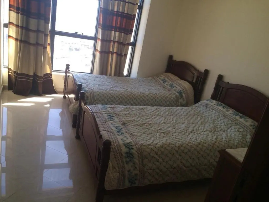 Newcenter Suites - Chambres