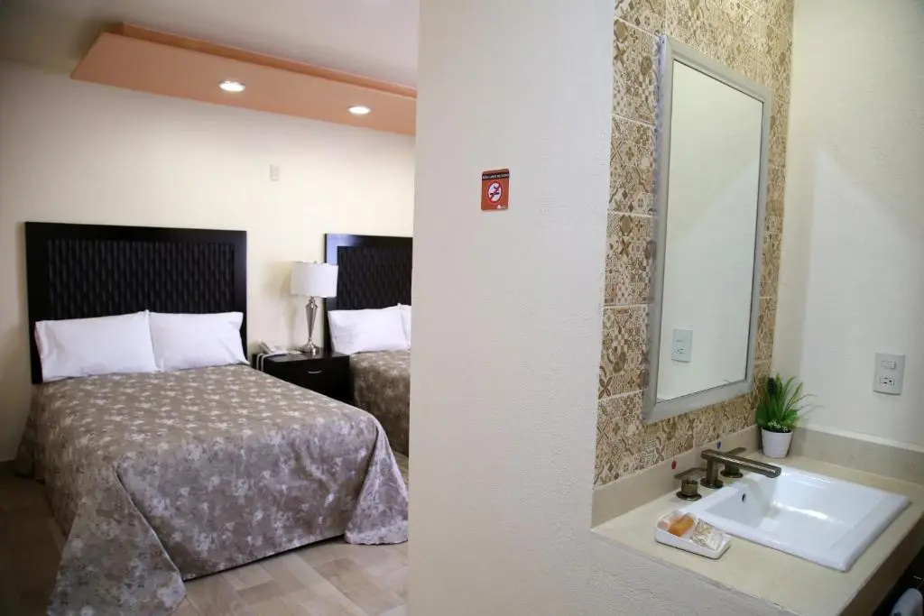 Hotel Plaza Bernal - Chambres