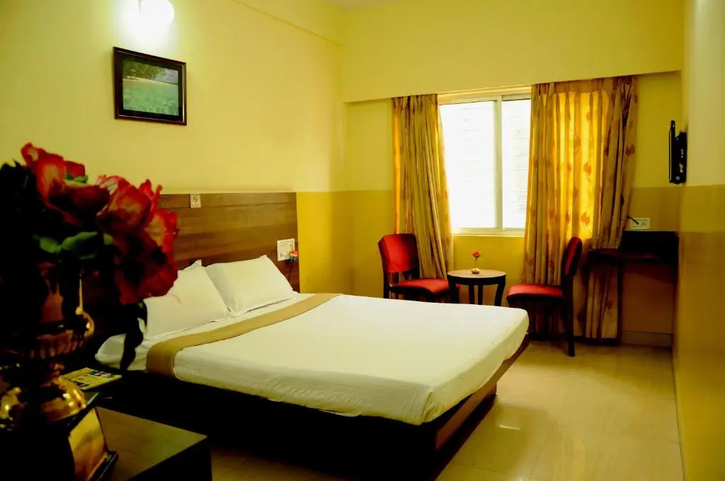 Suvarna Residency - Chambres