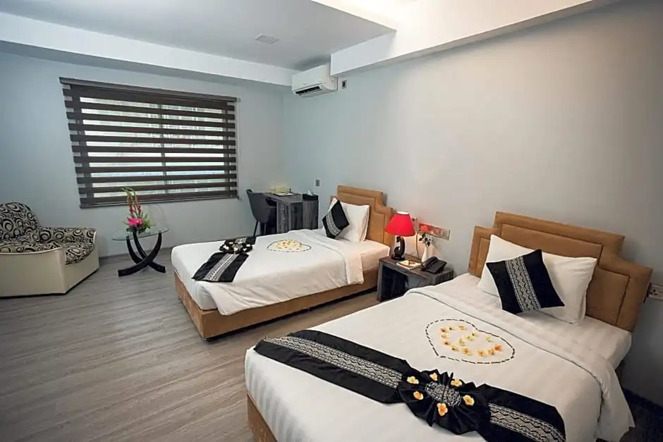 Elegant Hotel Pyi Thar Yar - Chambres