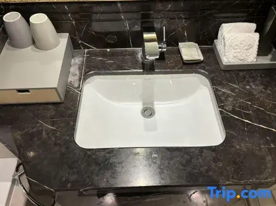 Baiyunbian Hotel - Chambres