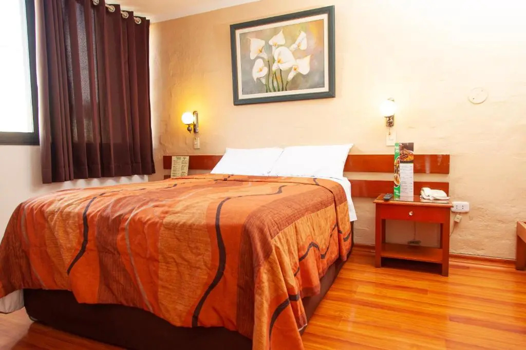 Hotel Holiday Suites - Chambres