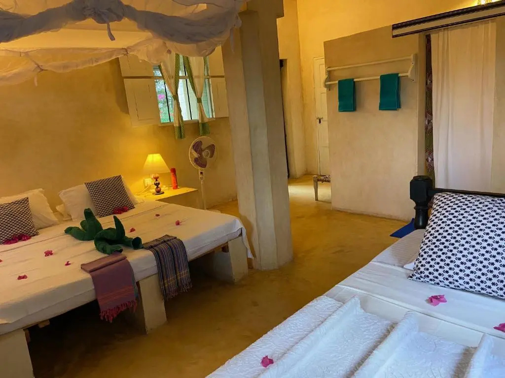 Banana House And Wellness Centre - Chambres