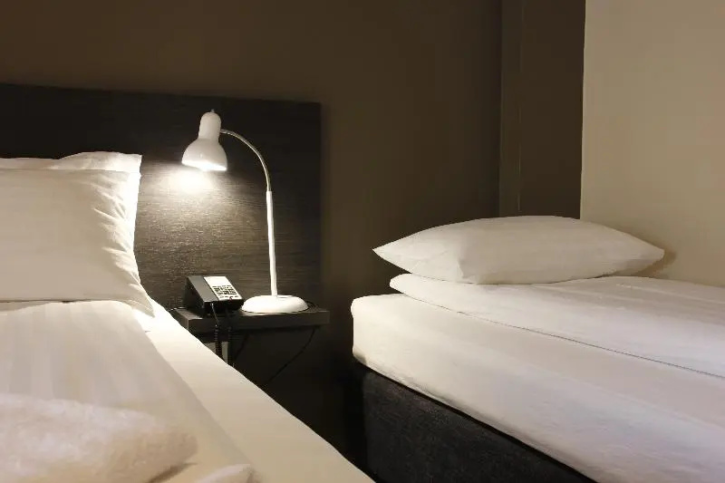 Konvin Hotel - Chambres
