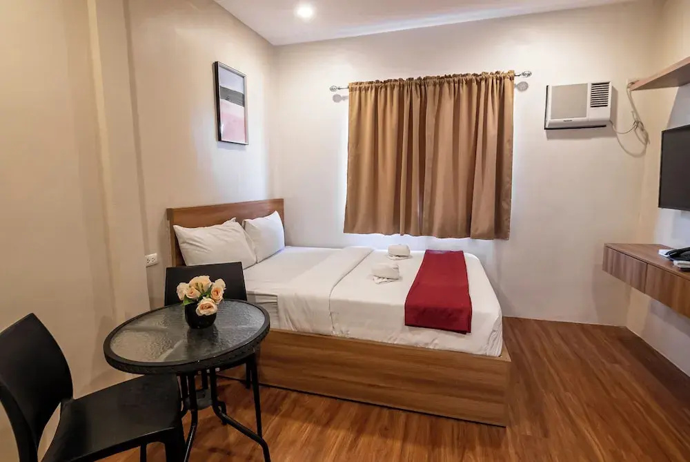 Kiwi Hotel - Chambres