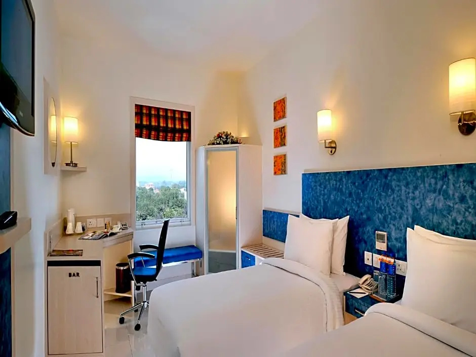 Kalyan Grand - a business hotel - Chambres