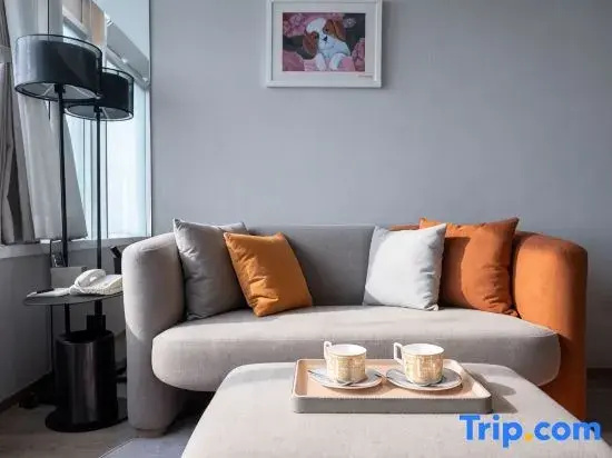 Jingguang Center Apartment Hotel - Chambres