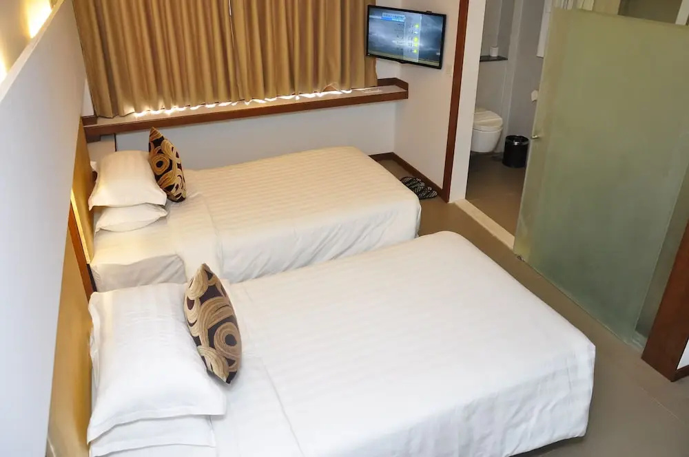 The RGN City Lodge - Chambres