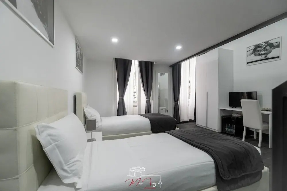 Трёхместный номер Standard 2 отдельные кровати в Arch Rome Suites