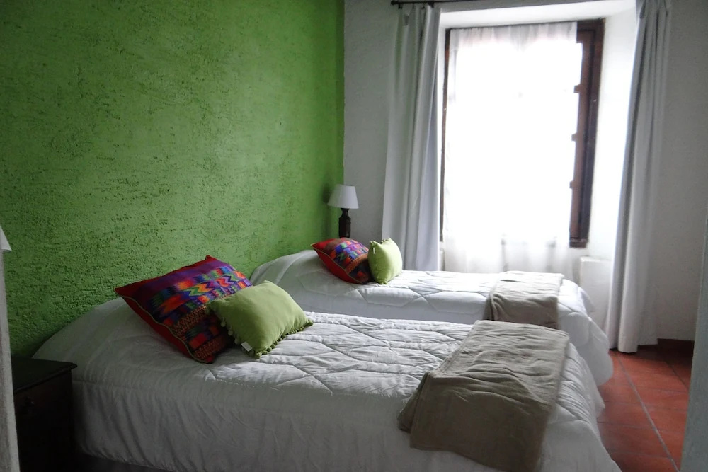 Hotel Casa Naranjo - Chambres