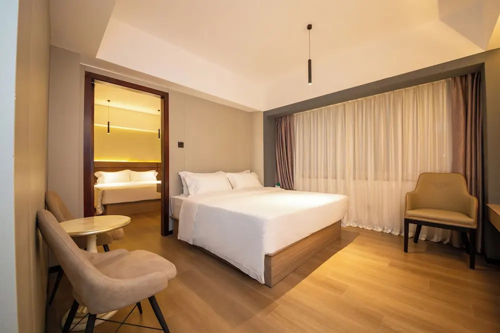 Jinguan Holiday Hotel - Chambres