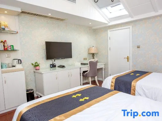 Baibuge Hotel - Chambres