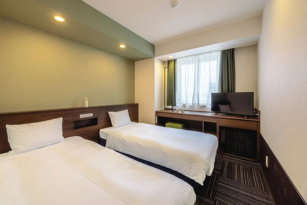 Kanku Izumiotsu Washington Hotel - Chambres