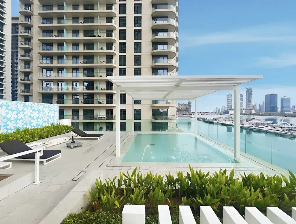 2BR Beachfront Retreat with Palm Views