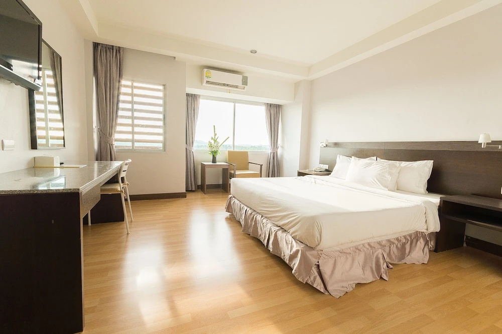Sinkiat Buri Hotel - Chambres
