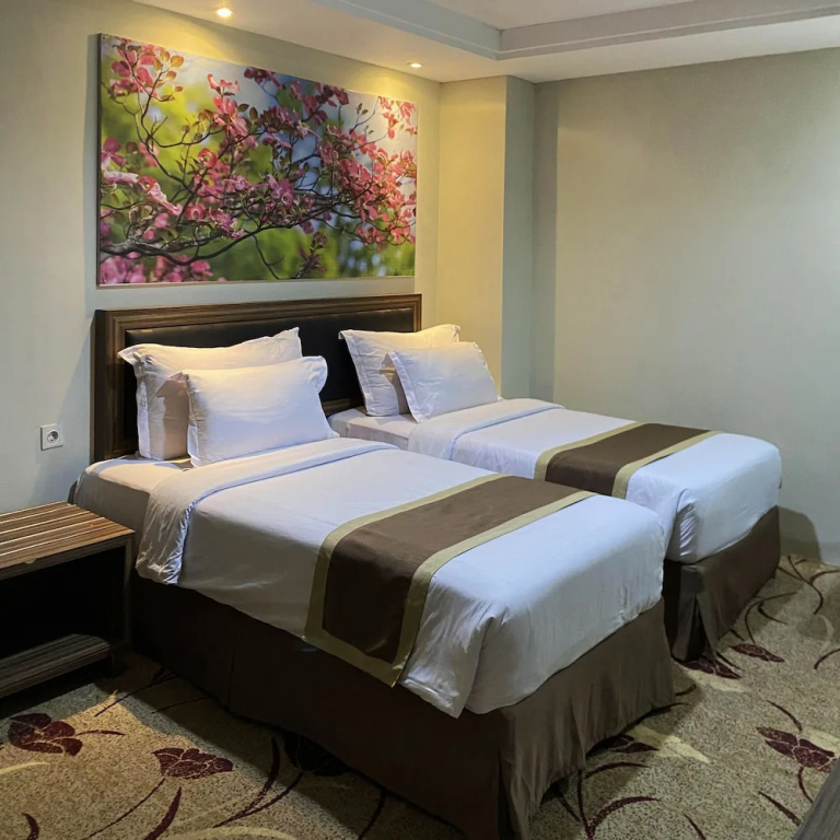 Travellers Hotel Phinisi - Chambres