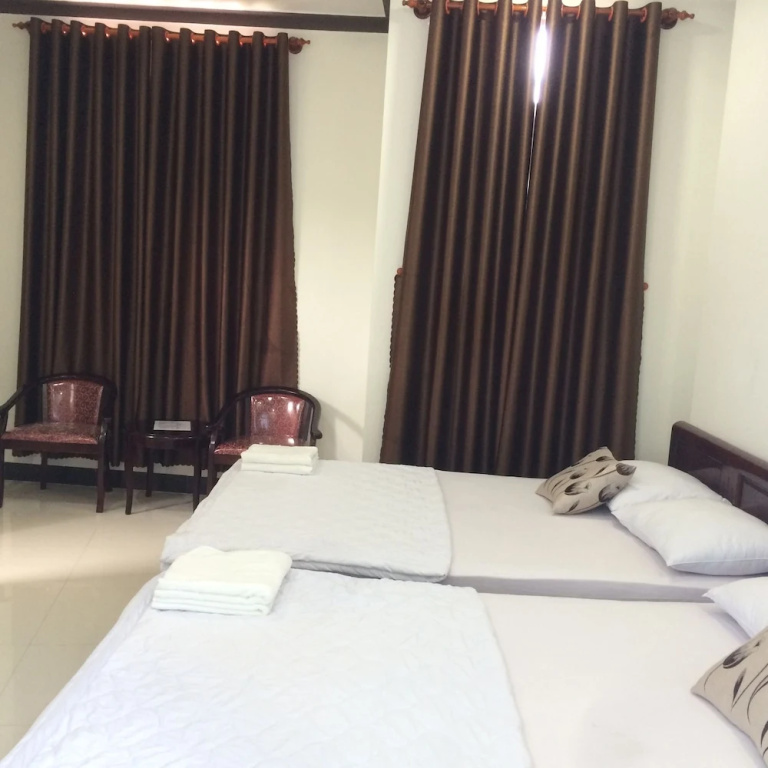 Standard Quadruple room with balcony and with city view
