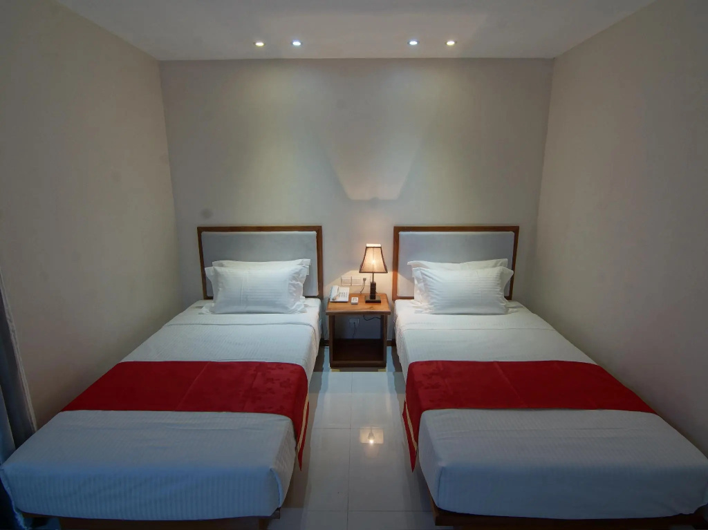 Yadanar Theingi Hotel - Chambres