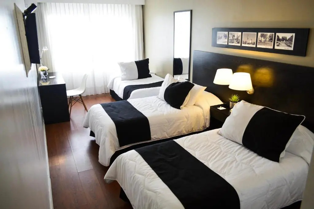 Pocitos Plaza Hotel - Chambres