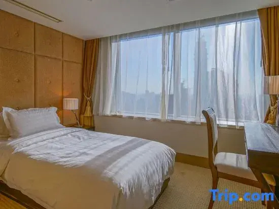 Jingguang Center Apartment Hotel - Chambres