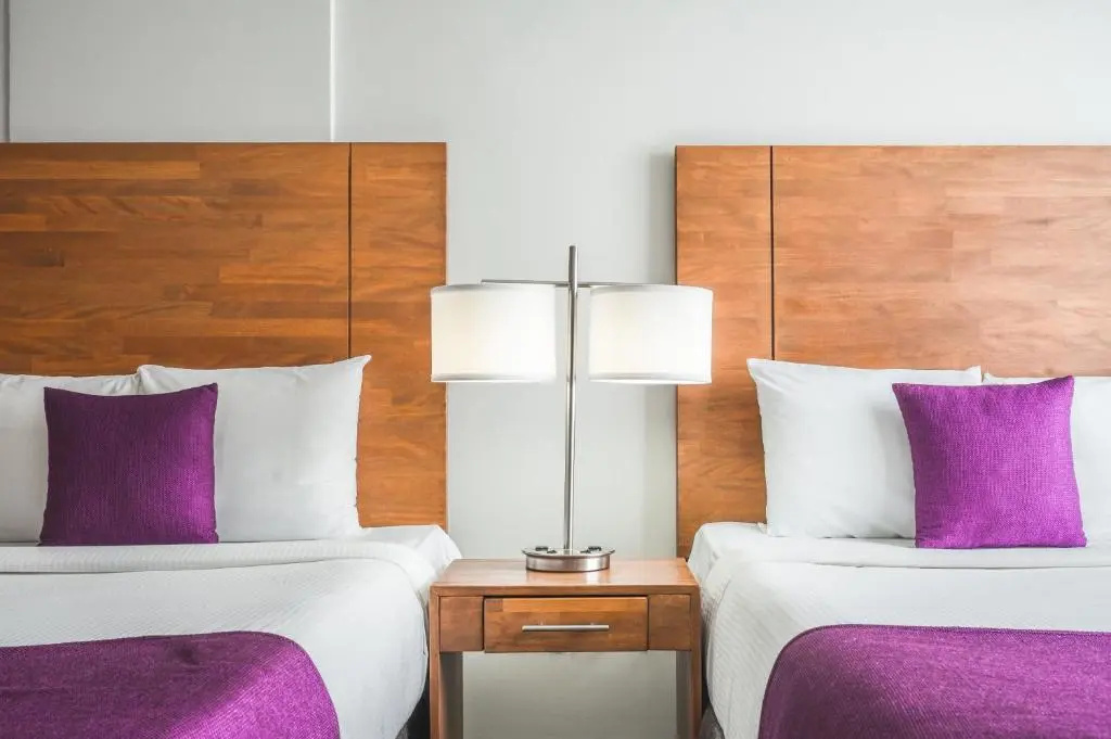 Majestic City Suites & Beach Hotel - Chambres