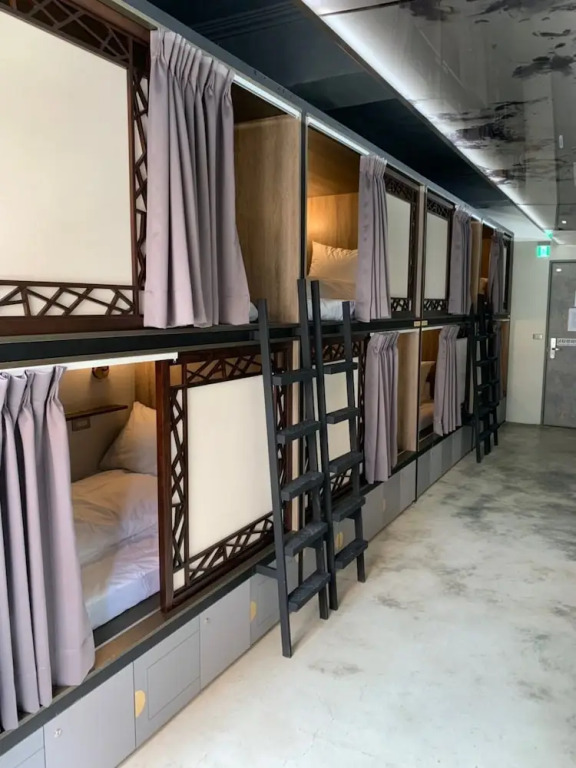 Кровать в общем номере в DAN Hostel