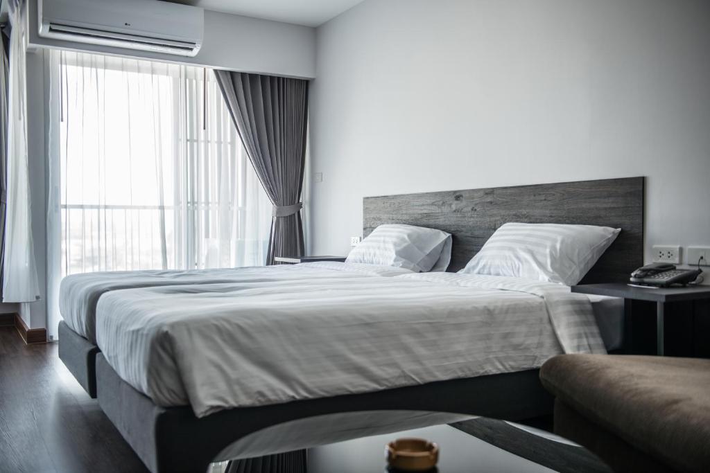 Двухместный номер Standard 2 отдельные кровати в Winner Sriracha Service Apartment