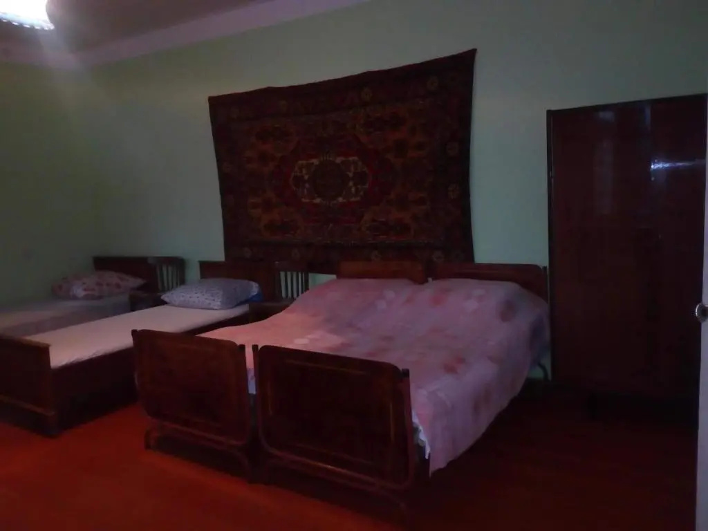 Standard Quadruple room with garden view