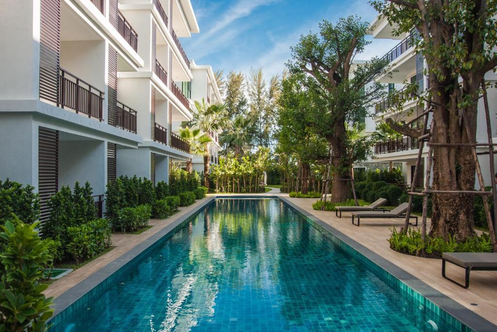 Люкс c 1 комнатой с видом на бассейн в The Title KR Beach Condotel Rawai Phuket