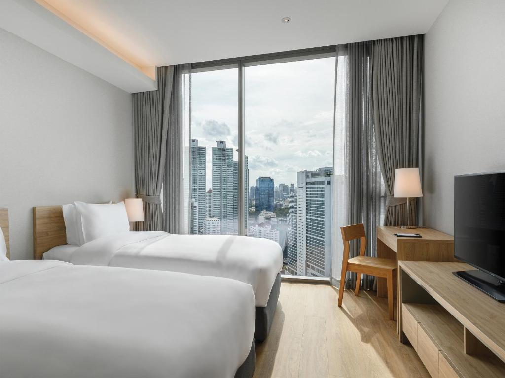 Апартаменты Executive с 2 комнатами в Oakwood Suites Bangkok
