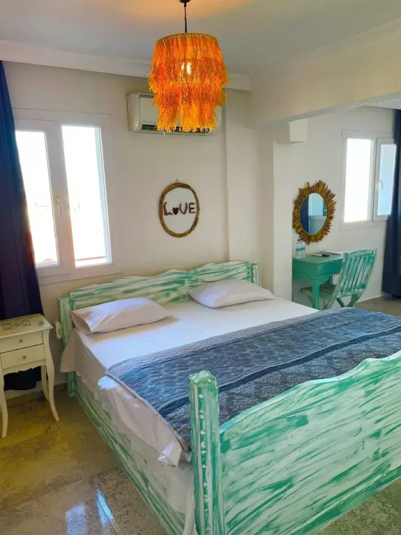 Standard Triple room with sea view