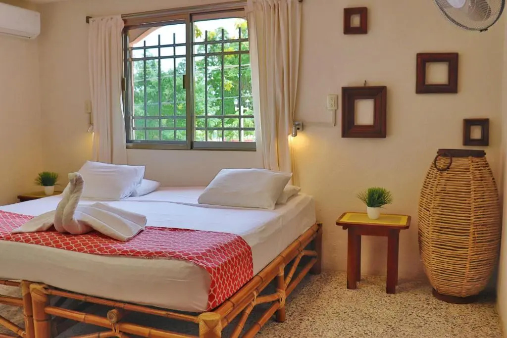 Hostal & Suites Pata de Perro - Chambres