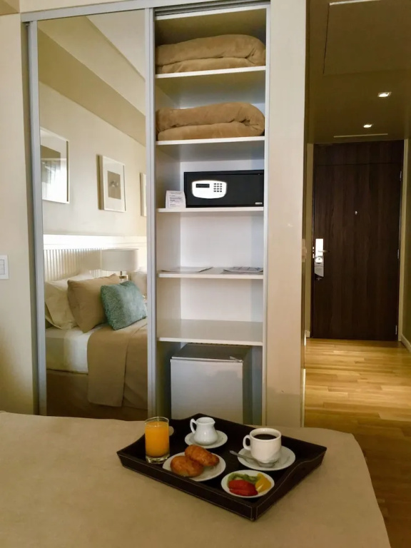 Hotel Metropolitano Supara - Chambres