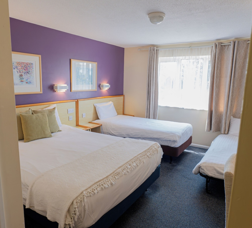 Travel Plaza Hotel - Chambres
