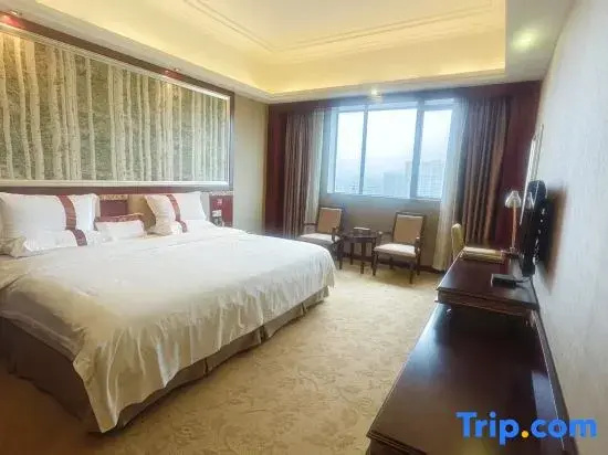 Longzhu Hotel - Chambres