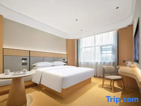 Qingxin Hotel - Chambres