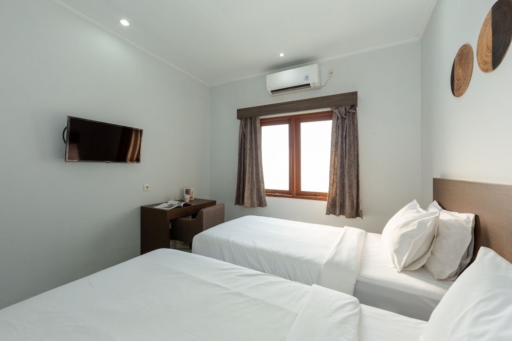 Отель Cove Matahari Guesthouse в Денпасаре