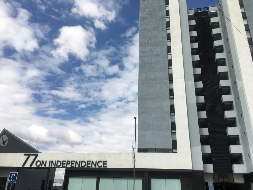 Highrise Windhoek apartment with skyline view, pool and gym