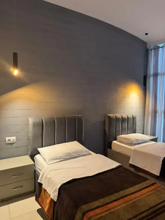 Hotel Gjuta - Chambres