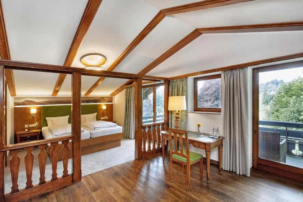 Double Suite with balcony and with mountain view full double bed