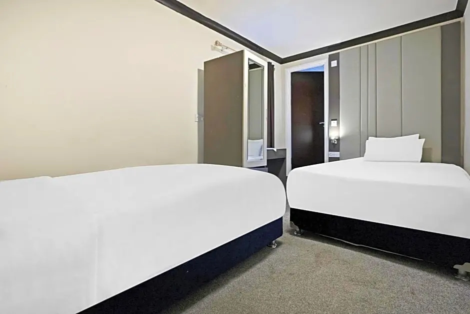 OYO The Baltimore Hotel - Chambres