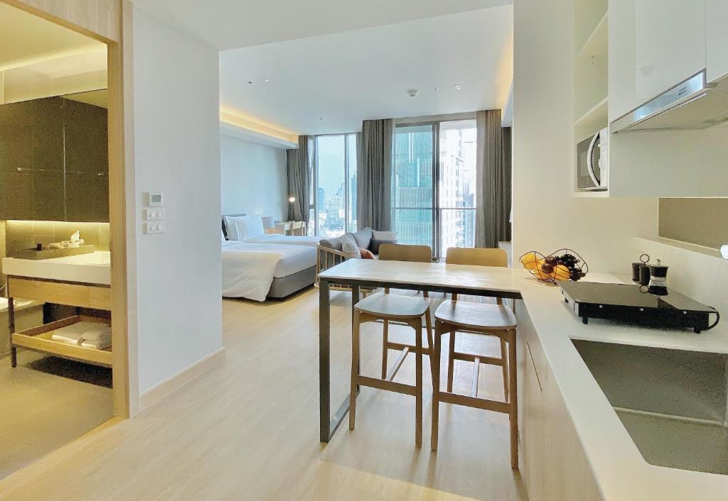 Двухместная студия Deluxe 2 отдельные кровати в Oakwood Suites Bangkok