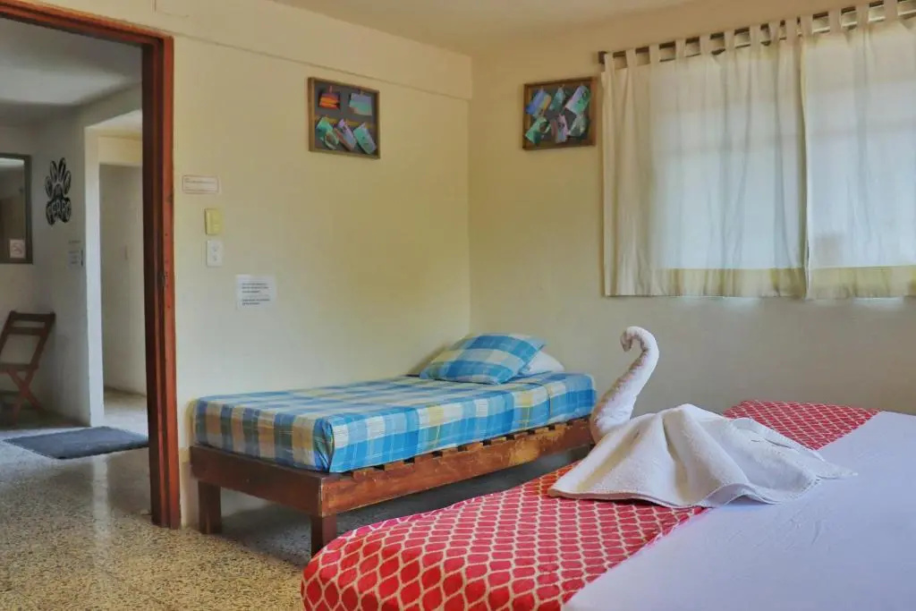 Hostal & Suites Pata de Perro - Chambres