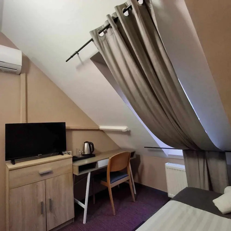 Hotel Unicornis - Chambres