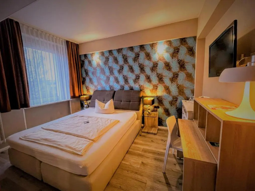 Arena Hotel - Chambres
