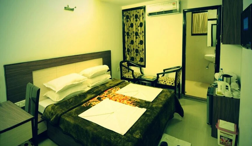 HKJ Residency - Chambres